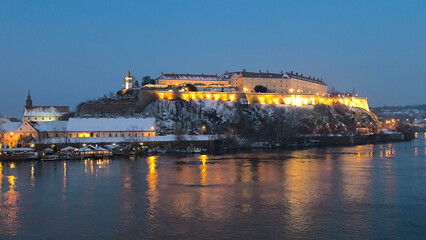 panorama of Petrovaradin Fortress in snowy winter night