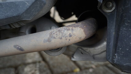 The condition of motorcycle exhaust that corrodes due to exposure to water and hot temperatures
