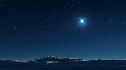 Fototapeta premium Night sky with a bright star shining over dark clouds.