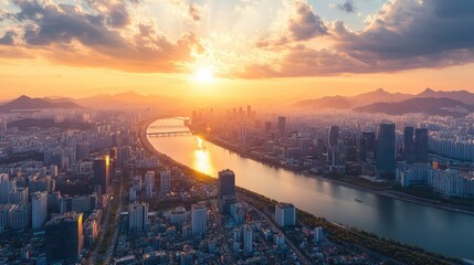 Fototapeta premium Aerial view of Seoul, South Korea, with the Han River winding through the city, framed by towering skyscrapers and historical landmarks.