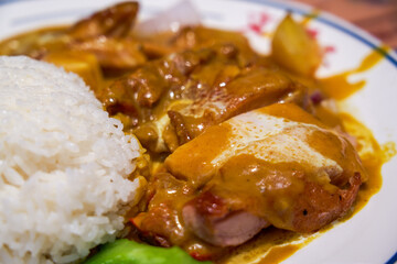 Delicious and fragrant curry pork chop rice in Hong Kong tea restaurant