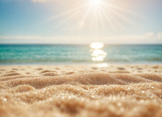 summer background of beach sand in the foreground and sea in the background