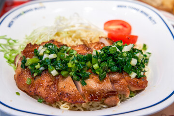 Delicious fried chicken chop and scallion oil noodles in Hong Kong tea restaurant