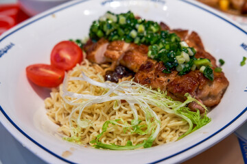 Delicious fried chicken chop and scallion oil noodles in Hong Kong tea restaurant