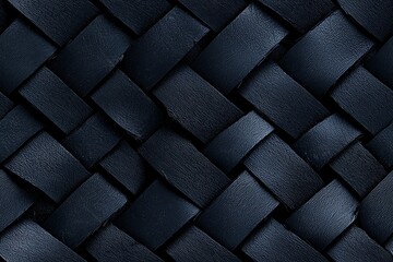Naklejka premium Close-up of a dark woven texture, showcasing intricate patterns and rich details that add depth and elegance to any design project.