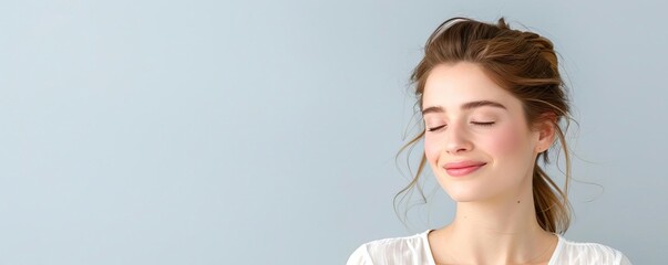 Profile of a serene woman with a blank background, minimalist studio portrait photography, calm simplicity