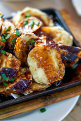 A delicious Chinese dish, deep fried eggplant stuffed with meat