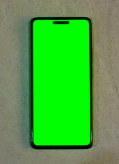 selective focus isolated on white, cellphone or smartphone with green screen