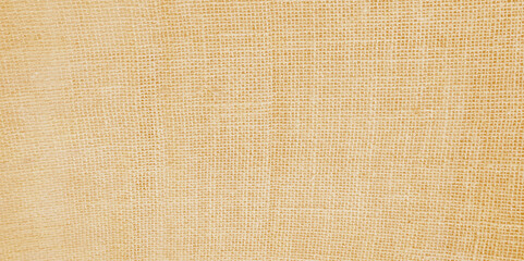 Jute hessian sackcloth canvas woven texture pattern background in light beige cream brown color blank empty