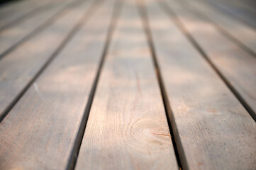 Wooden flooring, wooden decking on the terrace of a country house.