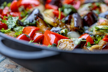 Grilled vegetable salad with zucchini, eggplant, onion, pepper and tomato