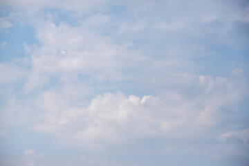 Sky background with clouds. White clouds against a blue sky.