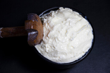 White butter made from cow milk.