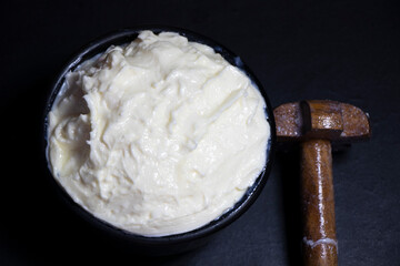 White butter made from cow milk.