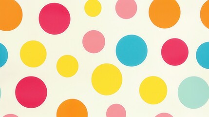 This surface features an arrangement of colorful polka dots in multiple sizes on a light backdrop