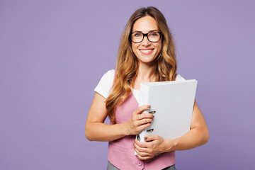 Young successful employee business woman corporate lawyer wear classic suit vest t-shirt glasses work in office hold white folder for papers document bookkeeping isolated on plain purple background.
