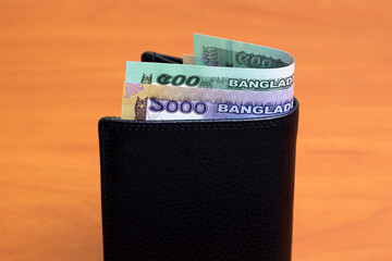 Bangladeshi taka in the black wallet