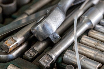 Closeup photo shoot of different nesessary tools and parts in every man's garage.Auto check up and...