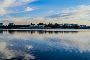 Fototapeta premium The beautiful sunrise reflecting on lake burley griffin, Canberra, in the morning