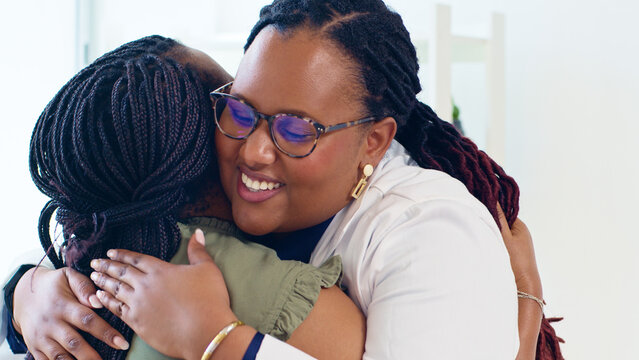 Caring Doctor Embracing a Young Patient in a Warm Hug, Symbolizing Compassion and Trust in a Medical Setting