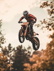 Naklejka premium Dirt Bike Rider in Mid-Air