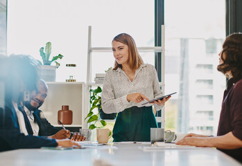 Businesswoman, tablet and presentation discussion in office with team for budget report or company profit. Finance collaboration, employees or technology with feedback in boardroom for sales planning