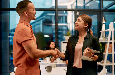 Business, people and shaking hands in office for welcome, greeting and introduction with smile. B2b collaboration, employees and handshake at workplace for partnership deal, agreement and onboarding