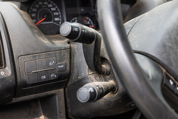 Very dirty and neglected car interior. View of the dashboard.