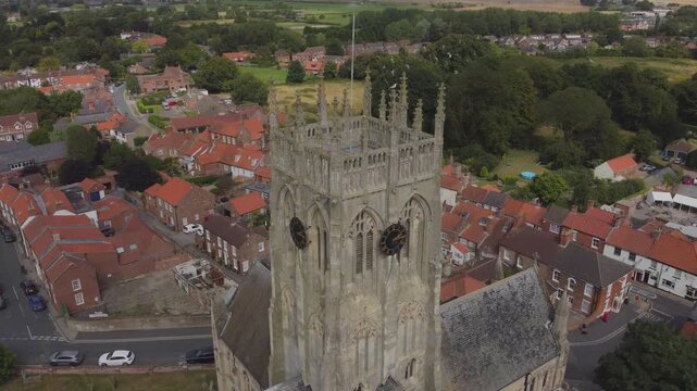 Drone. UK village. Church. Middle class housing estate. Hull.UK. 6.7.2024