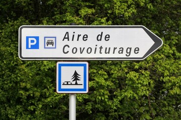 Carpool point and parking road sign in France	