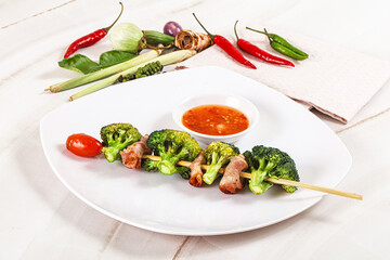 Thai Street foof satay with bacon and broccoli