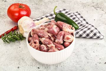 Fresh raw chicken hearts in the bowl