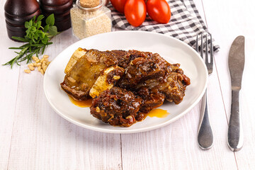 Prepared tasty beef ribs with sauce