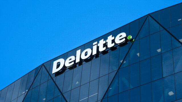 Deloitte sign and logo on office building delivering audit and assurance, consulting, financial advisory services in capital city of Wellington, New Zealand Aotearoa - taken on 13 August 2024
