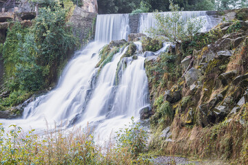 Beautiful waterfall among the ruins of an old paper factory in La Garrotxa.