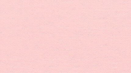 Fototapeta premium A texture background of slightly textured soft pink color paper, showcasing a mid-level granularity that mimics the look of colored construction paper