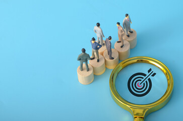 a group of businessmen stood together, their united posture signaling a strategic approach to their...