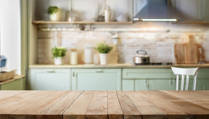 Background blurred of a beautiful and bright kitchen with wooden desk for objects
