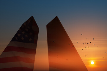 Silhouette of Towers and USA flag at sunset. 09.11.2001 American Patriot Day banner.