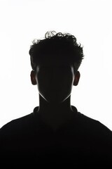 A man's head is shown in silhouette on a white background © Annamorphosis