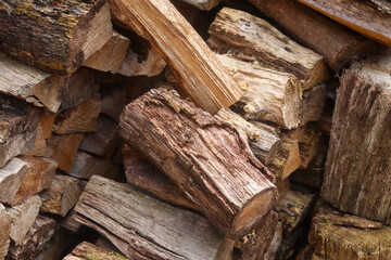chopped wood ready for the heating season in winter. wood stocks.stoke the stove.Close up. Firewood for the winter.Wood. Fire Wood. Background of wooden logs.