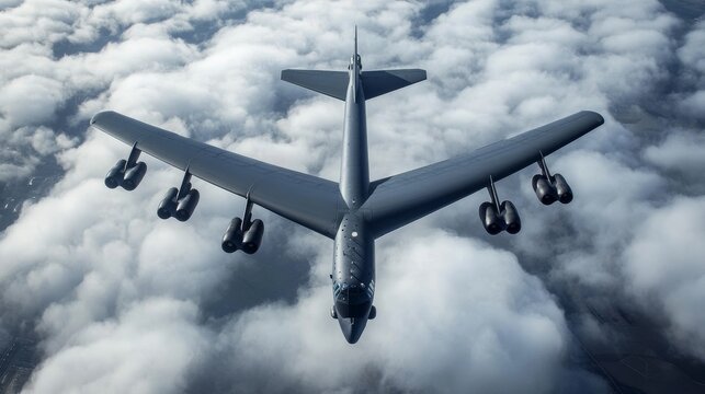 A powerful B-52 Stratofortress bomber flies high above the clouds, symbolizing military strength, aerial power, and strategic dominance.