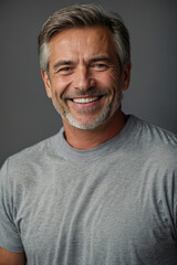 Fototapeta premium smiling handsome man with grey hair middle age