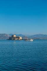Naklejka premium greece old capital nafplion streets shops churches castle and colorful houses quiet hours tourist destination