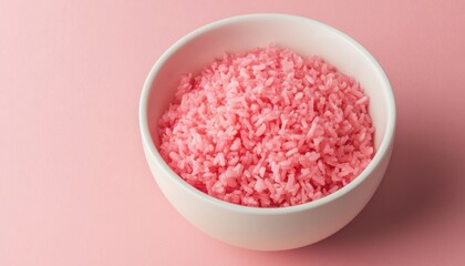 Pink rice in a white bowl on a pastel background showcasing bright colors and textures