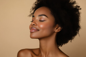 Fototapeta premium A close up of a black woman's face with her eyes closed