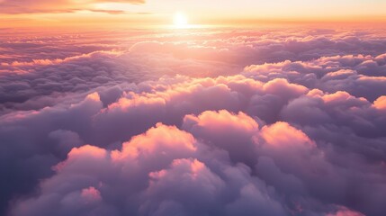 Capture the mesmerizing sight of aerial clouds at sunrise, when the first light of day illuminates their edges in shades of pink and gold.