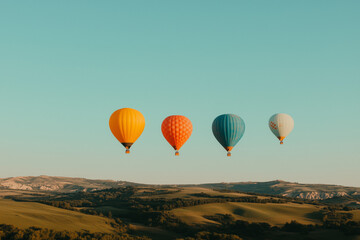 Fototapeta premium Colorful Hot Air Balloons Floating Over a Scenic Landscape 2