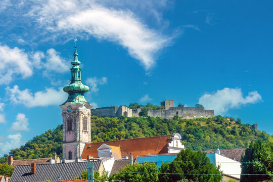 The village of  Hainburg cand der Donau with the ruins of the Hainburg castle in the background, Hainburg, Austria