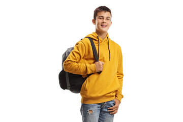 Male teenage student in a yellow hoodie and a backpack smiling at the camera